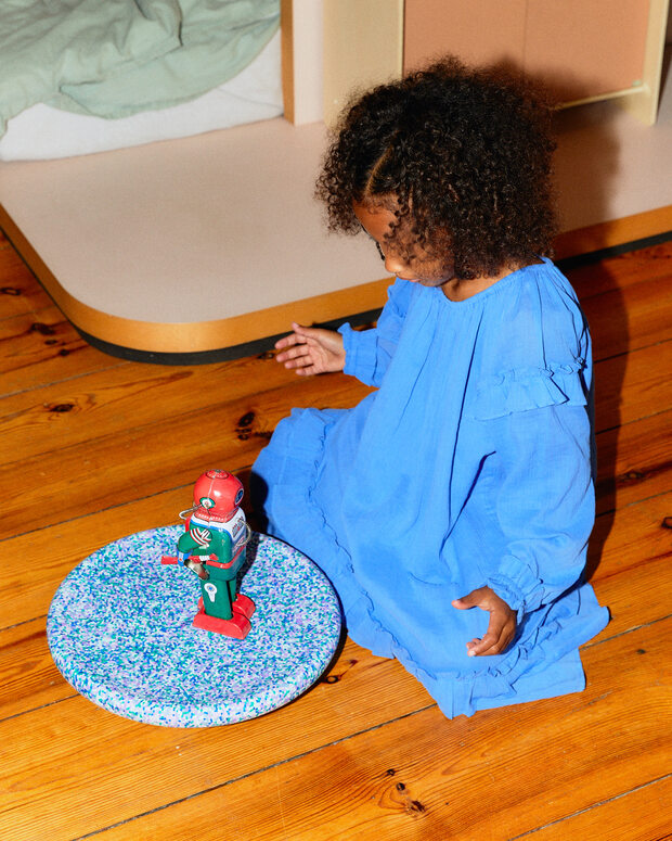  Child playing with Stapelstein® Board super cool