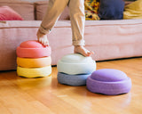 Kid is balancing over Original rainbow pastel